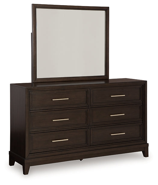 Neymorton King Upholstered Panel Bed with Mirrored Dresser and Chest